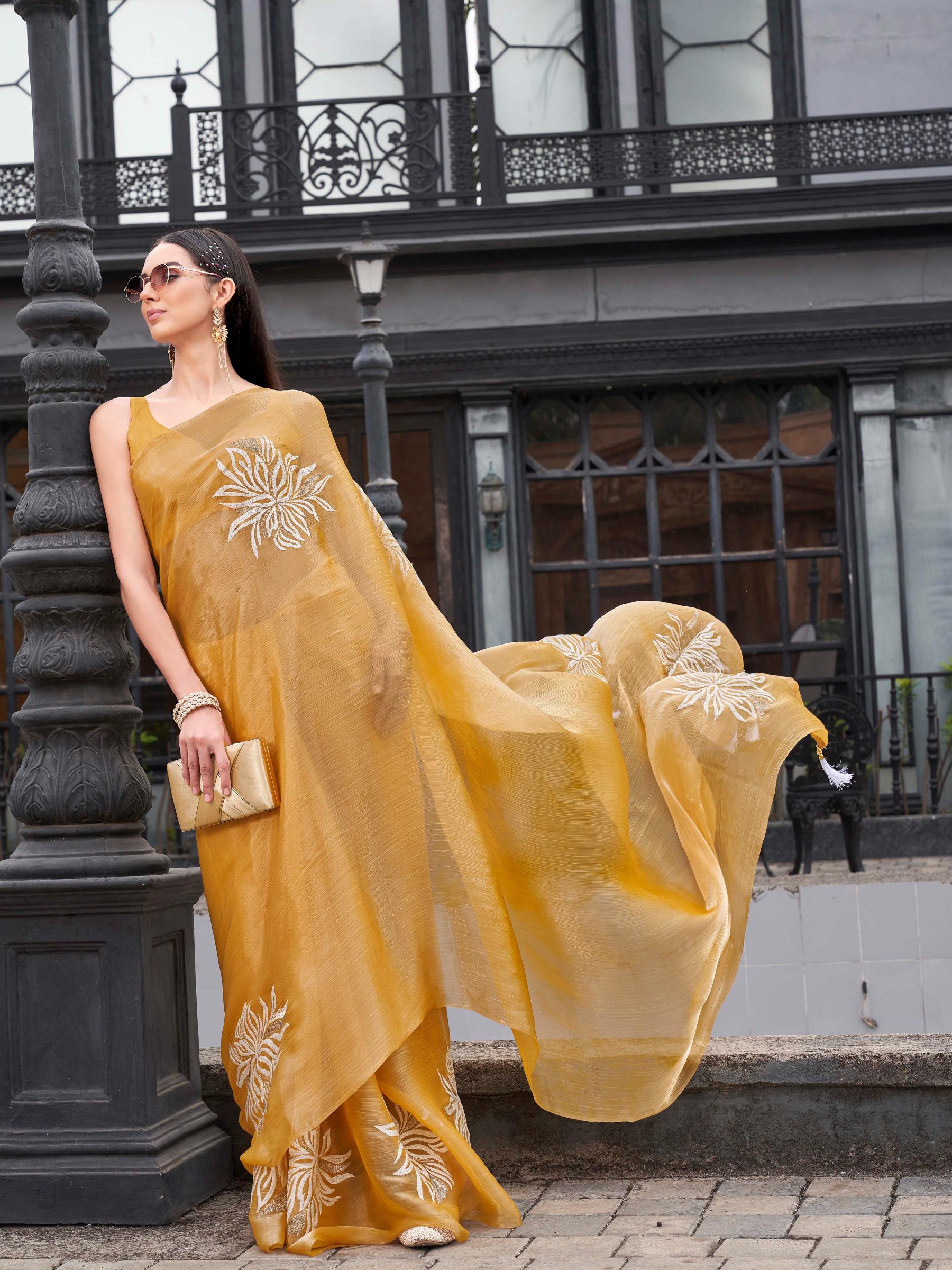 Yellow colored embroidred designer saree